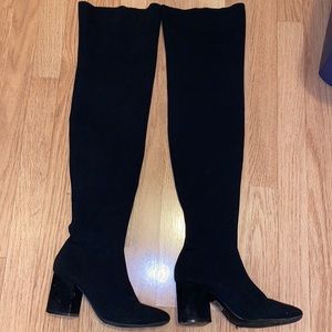 Over the knee heeled black boots